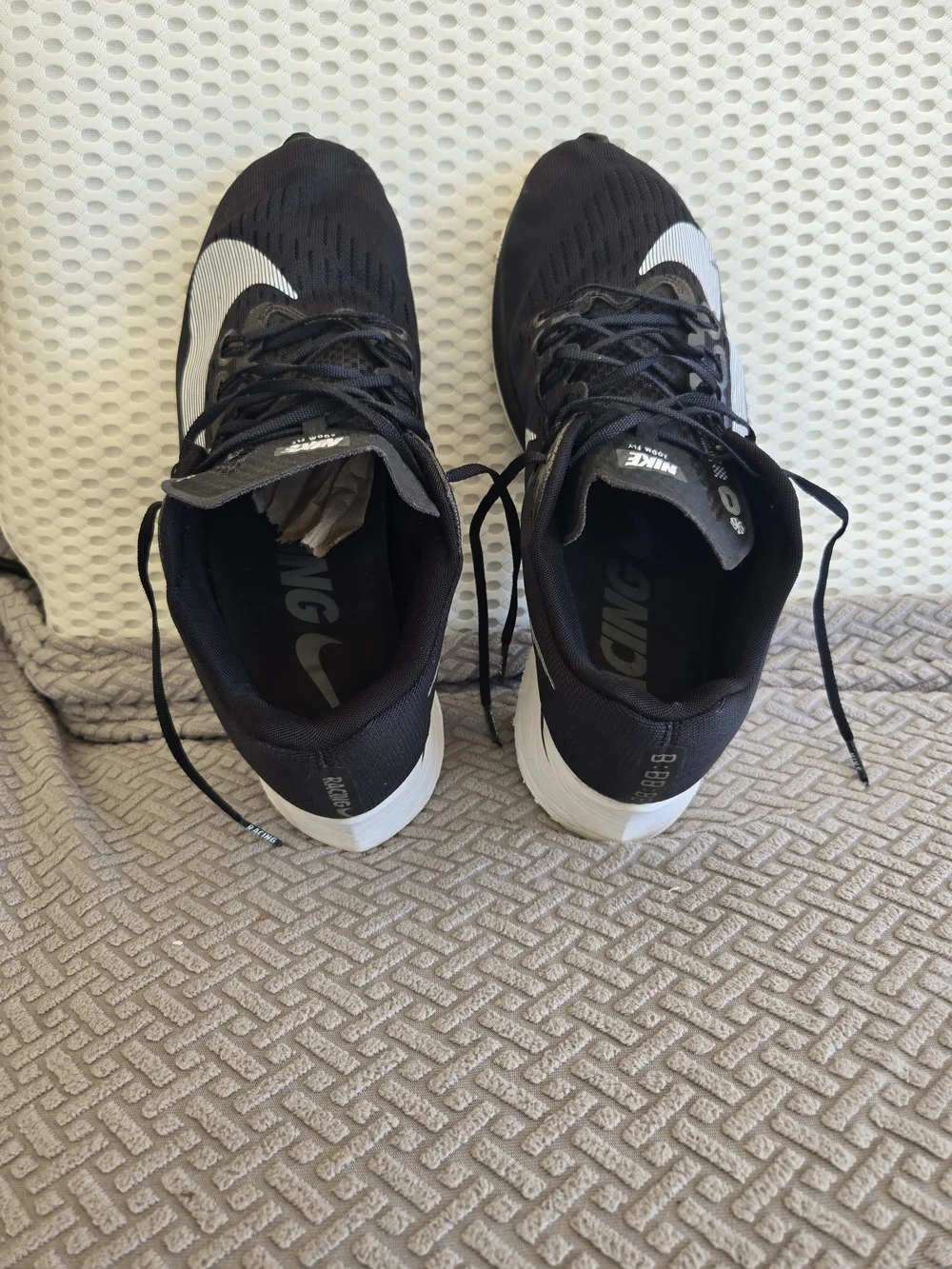 Nike Men’s Black Running Shoes with White Swoosh